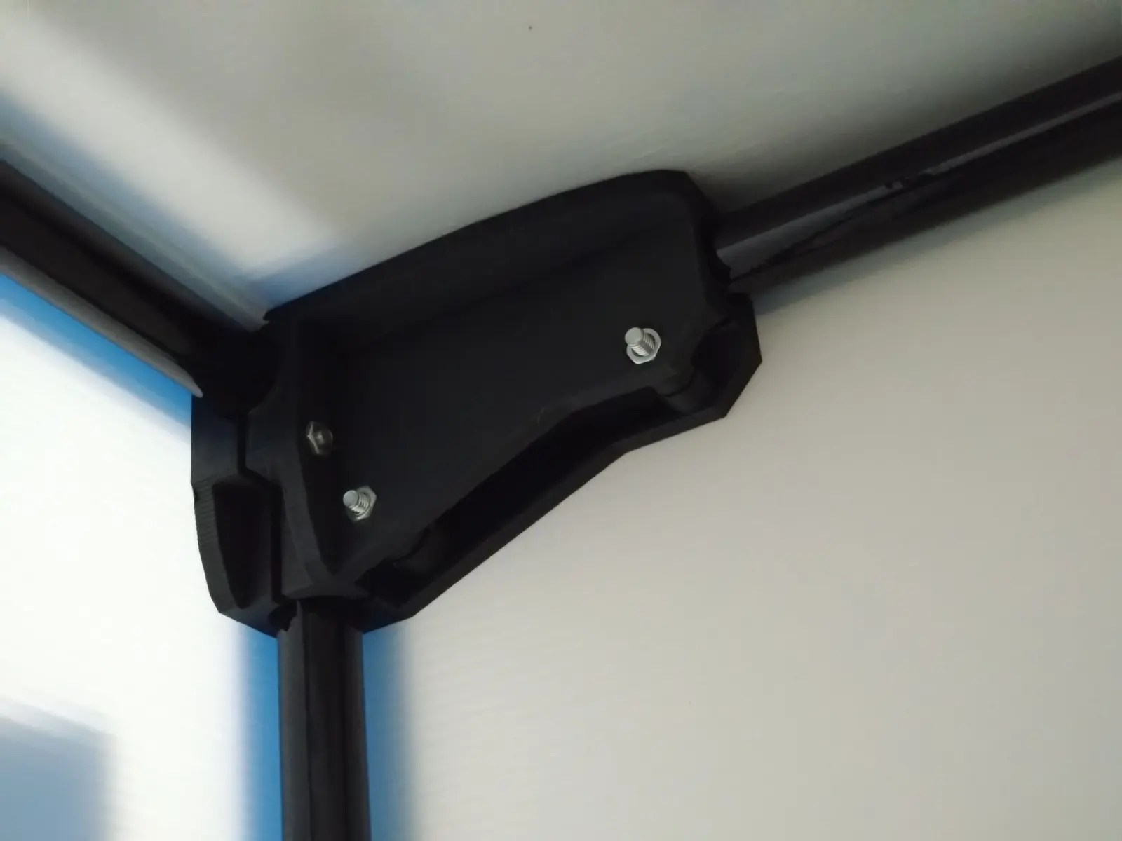 Printed top corner enclosure joint